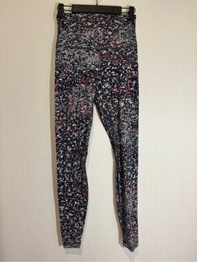 LULULEMON LEGGINGS. Size 4. Grey, Black, Red, White. 29.5” inseam. No flaws.
